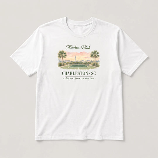 White t-shirt with a graphic design and text on a light gray background